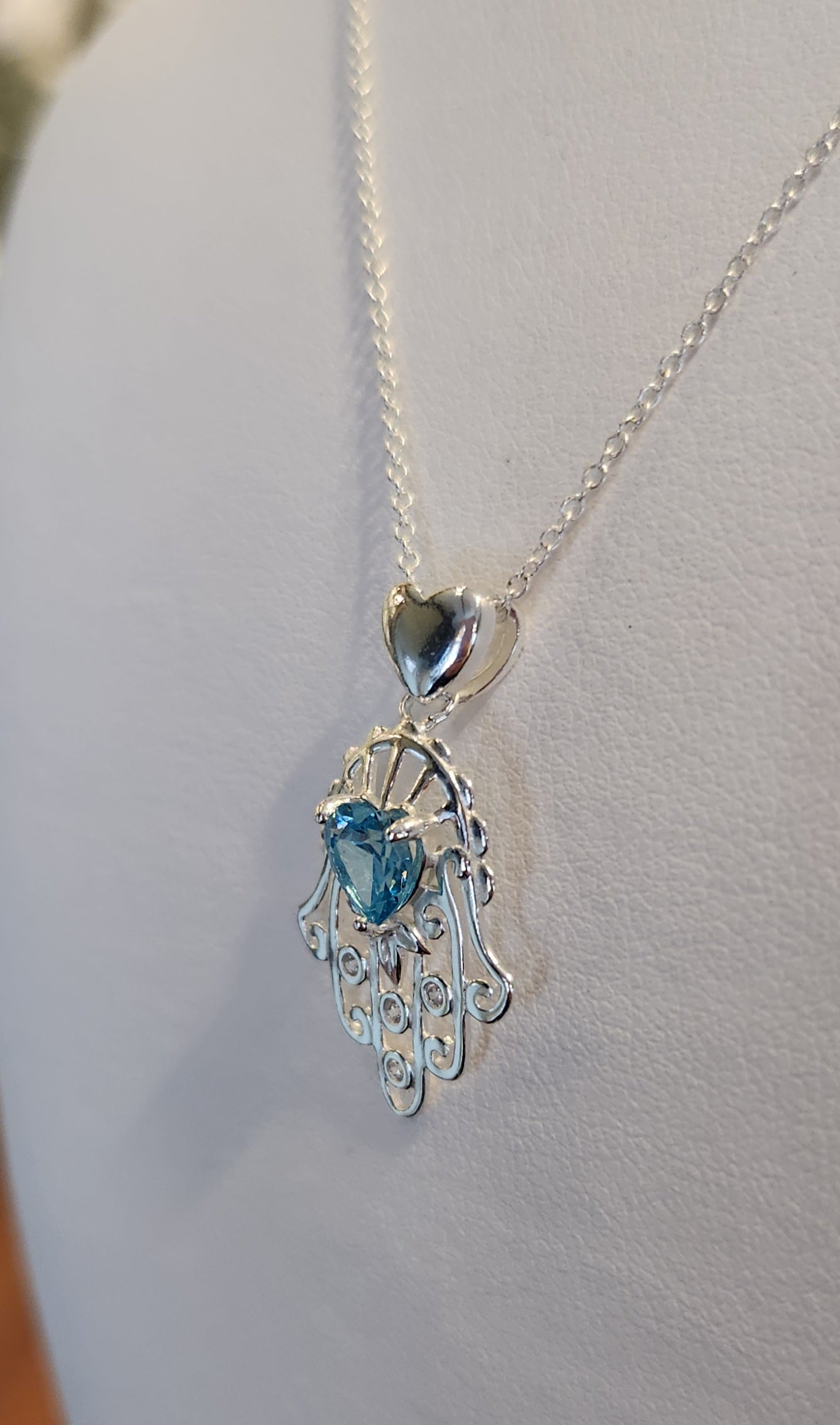 Sterling silver blue topaz Hamsa heart pendant