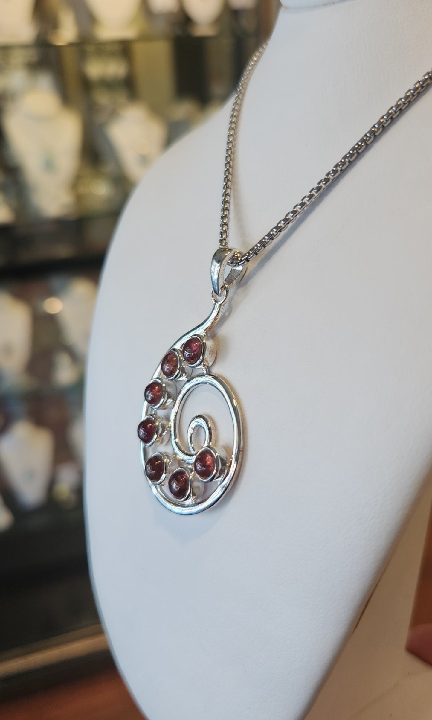 Sterling silver pink tourmaline spiral pendant