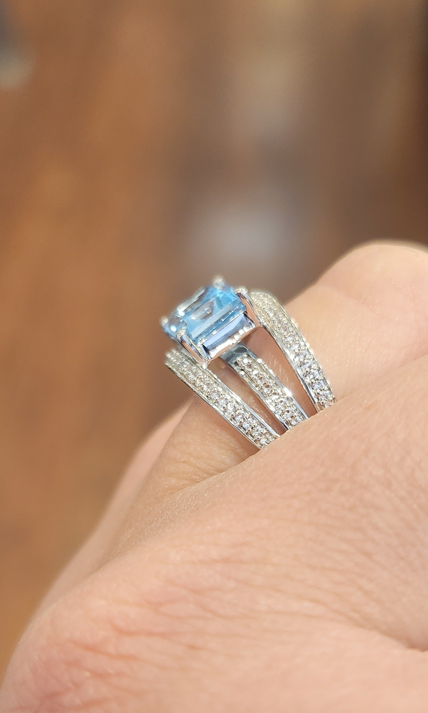 Sterling silver triple band blue topaz ring with diamonds