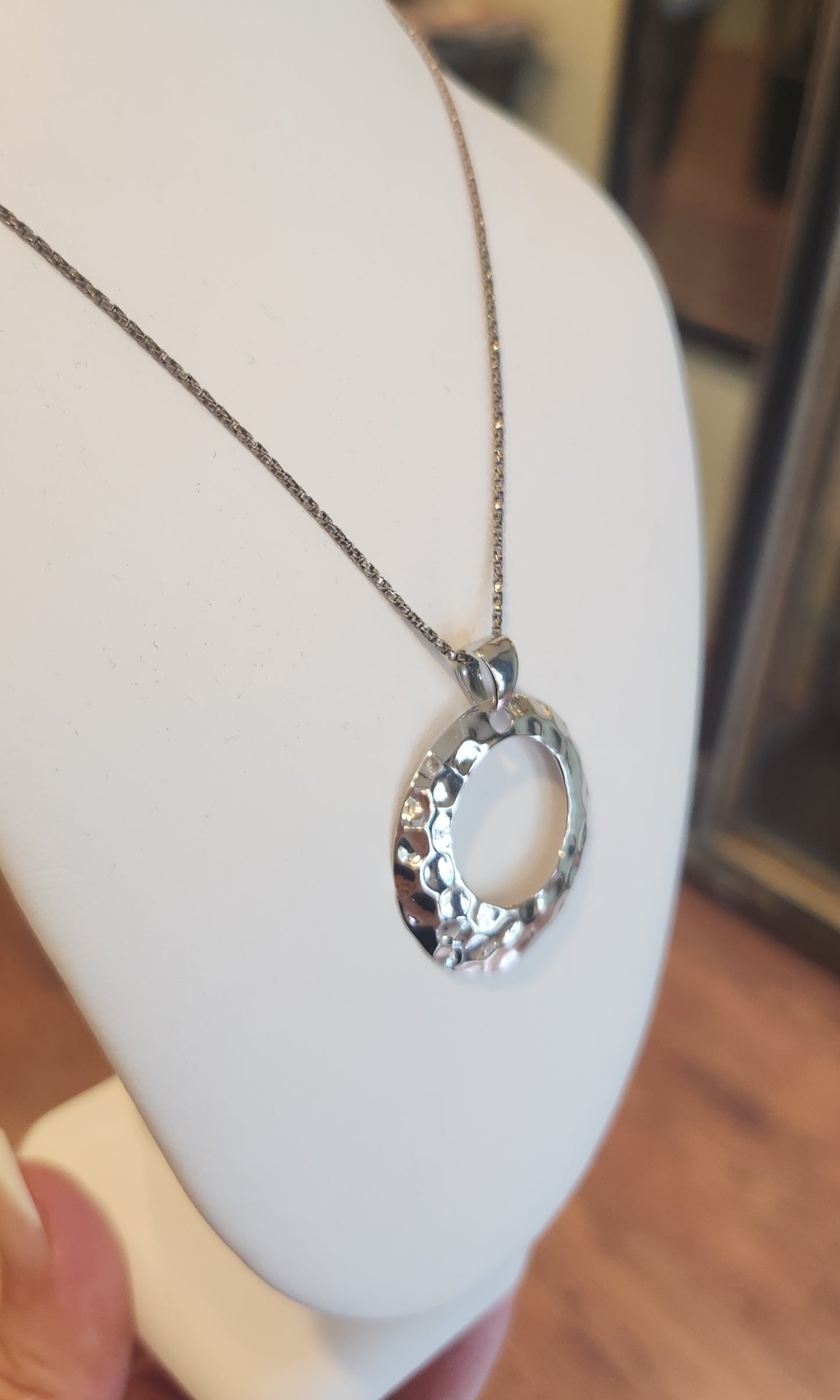 Sterling silver hammered circle pendant