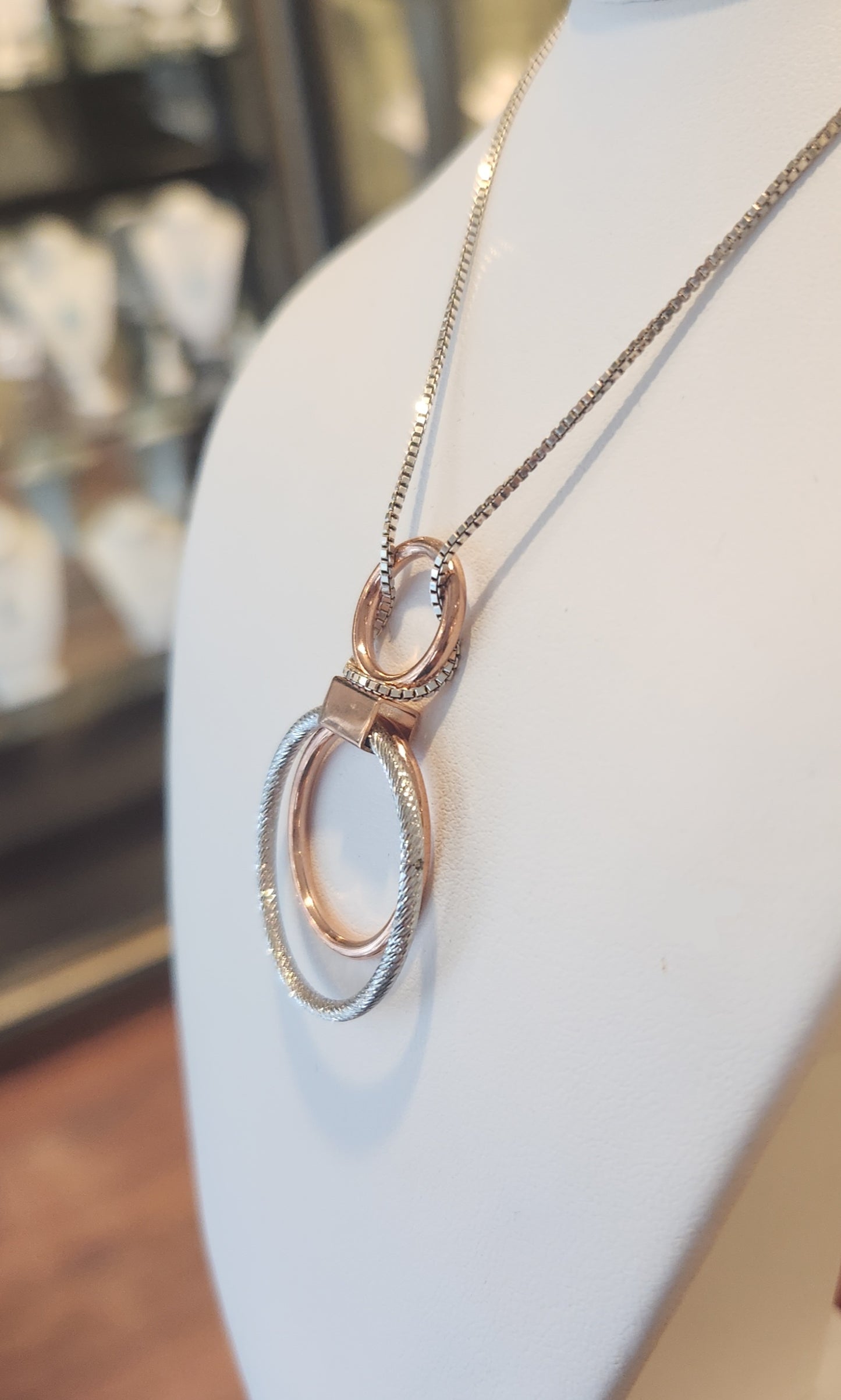 Sterling silver two-toned rings pendant