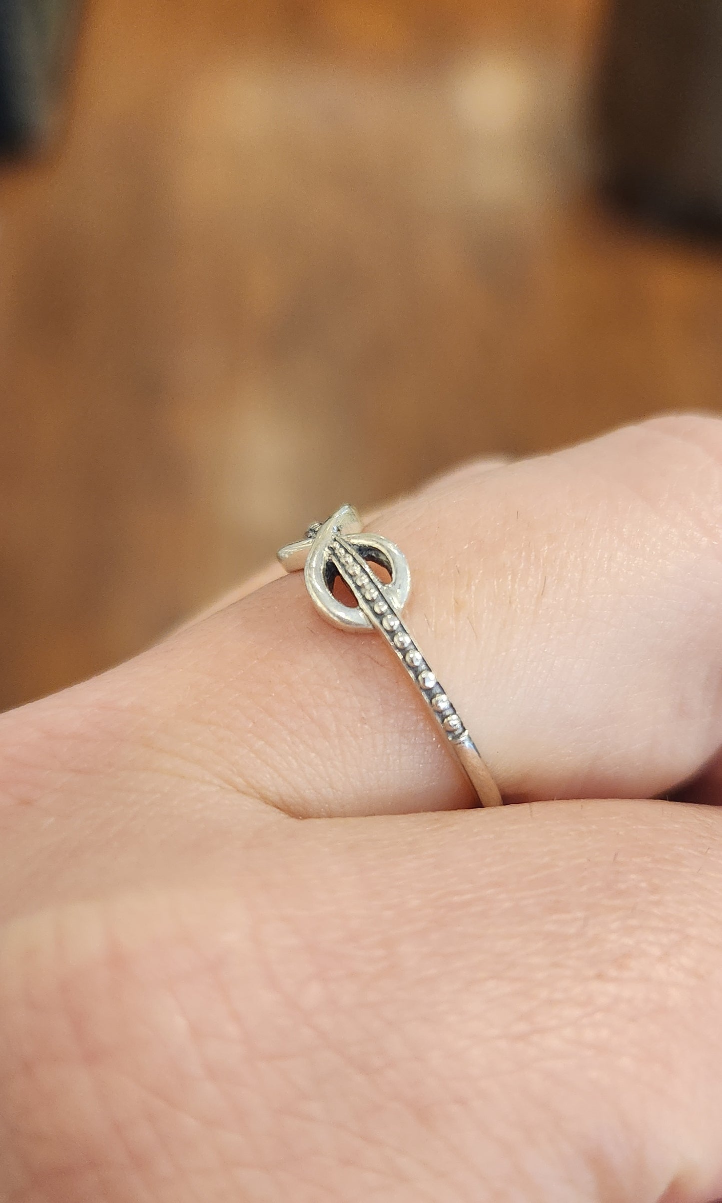 Sterling silver textured infinity ring