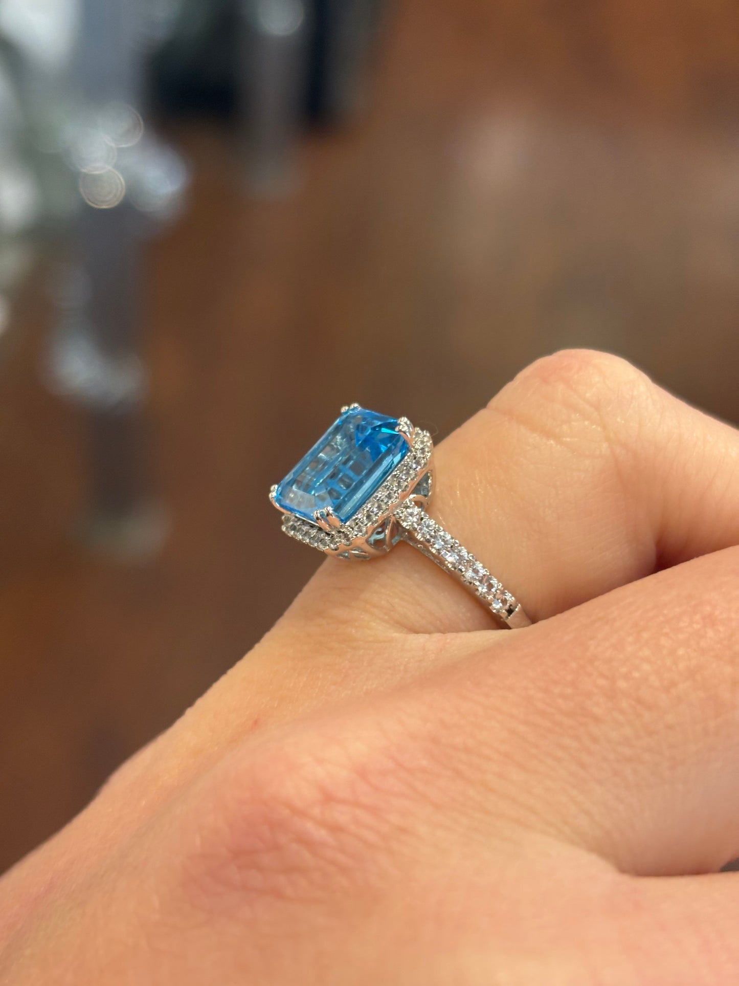 Sterling silver rectangle shaped blue topaz ring with diamonds