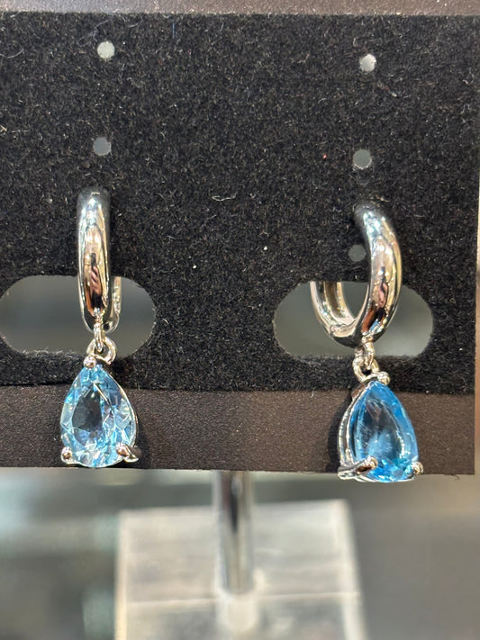 Sterling silver pear shaped blue topaz dangle hoop earrings