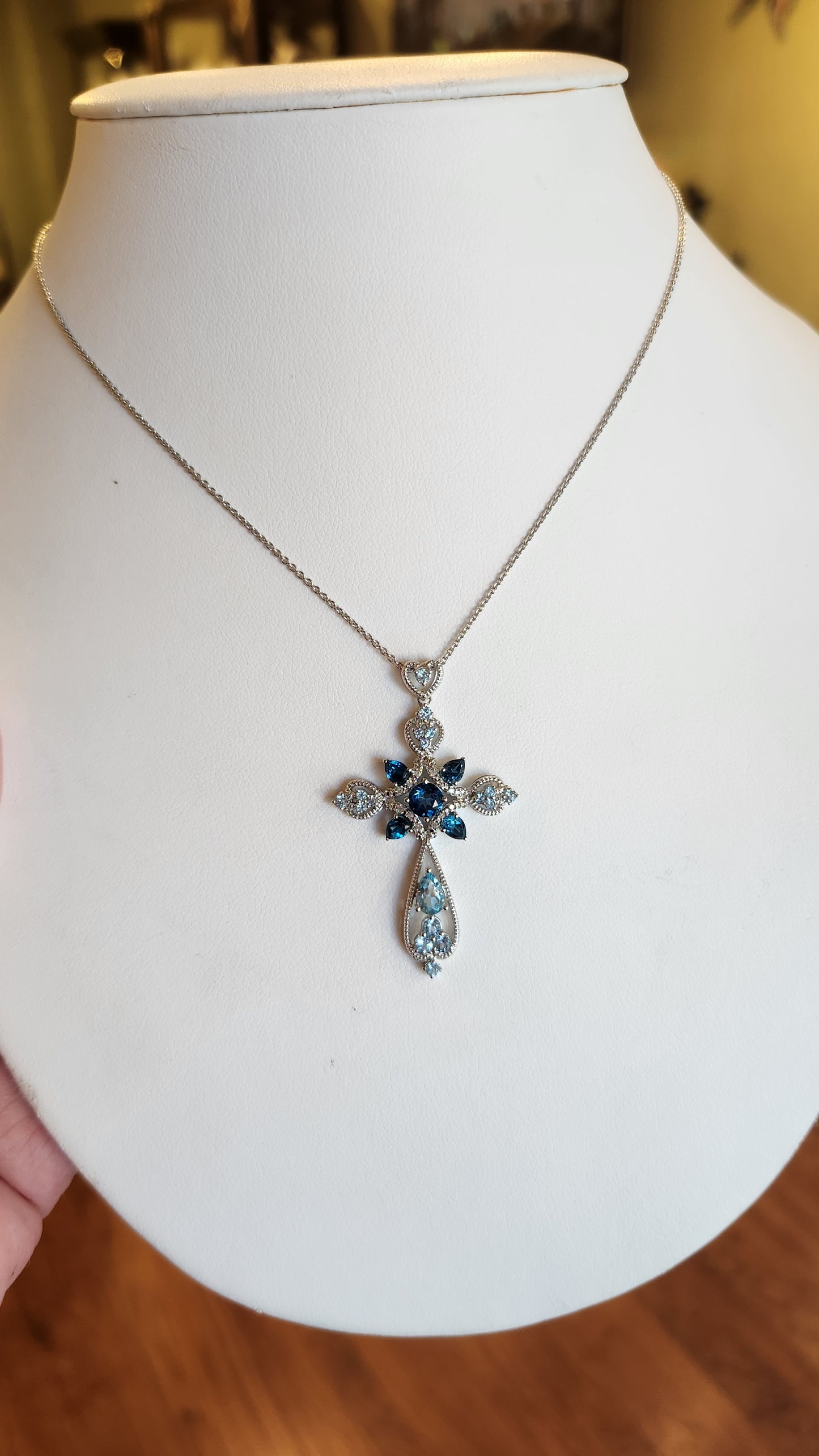 Sterling silver blue topaz cross