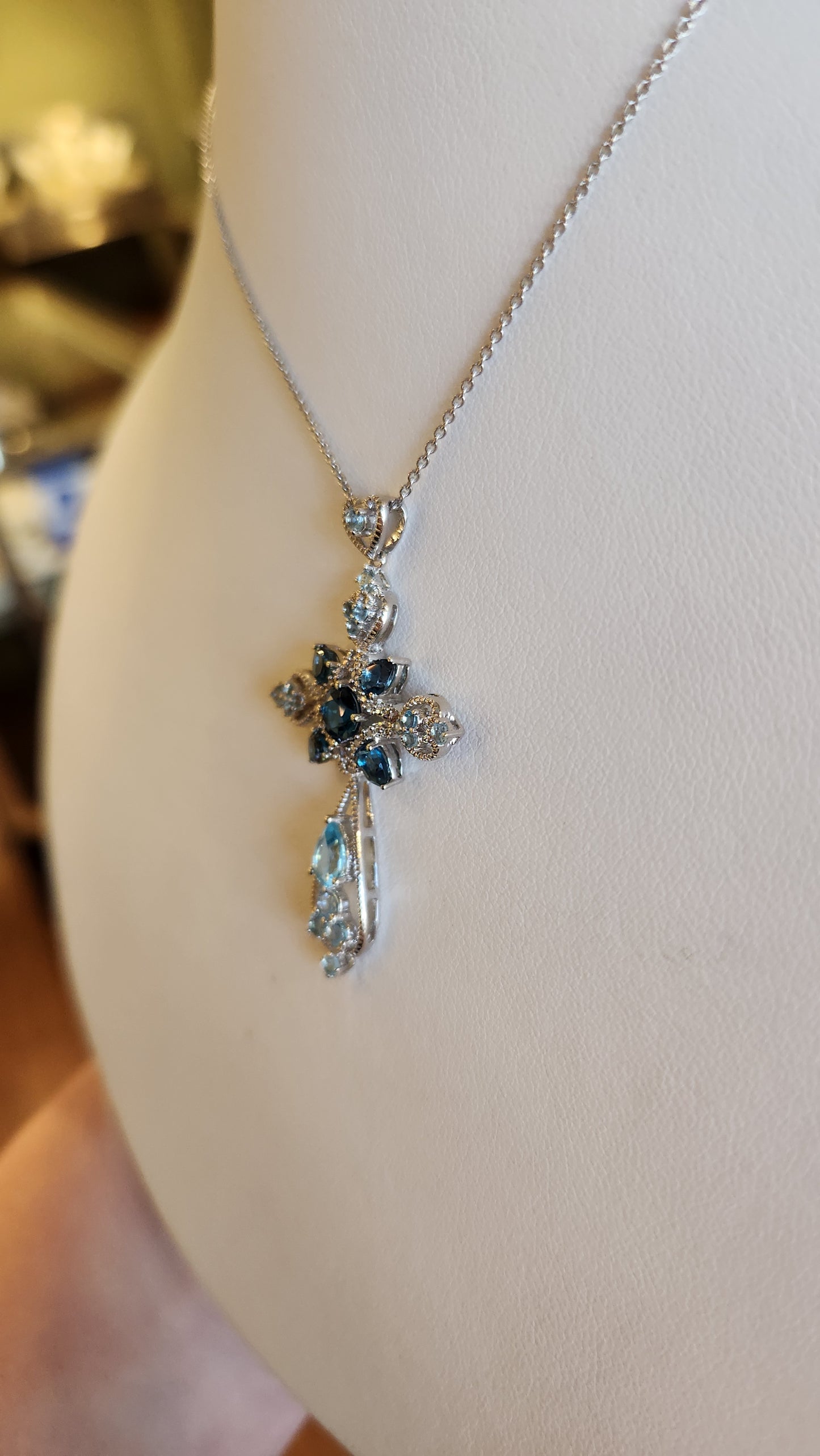 Sterling silver blue topaz cross