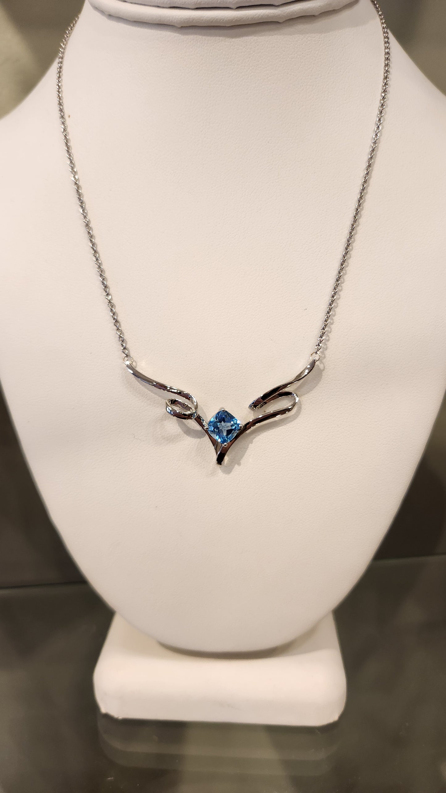 Sterling silver blue topaz ribbon necklace