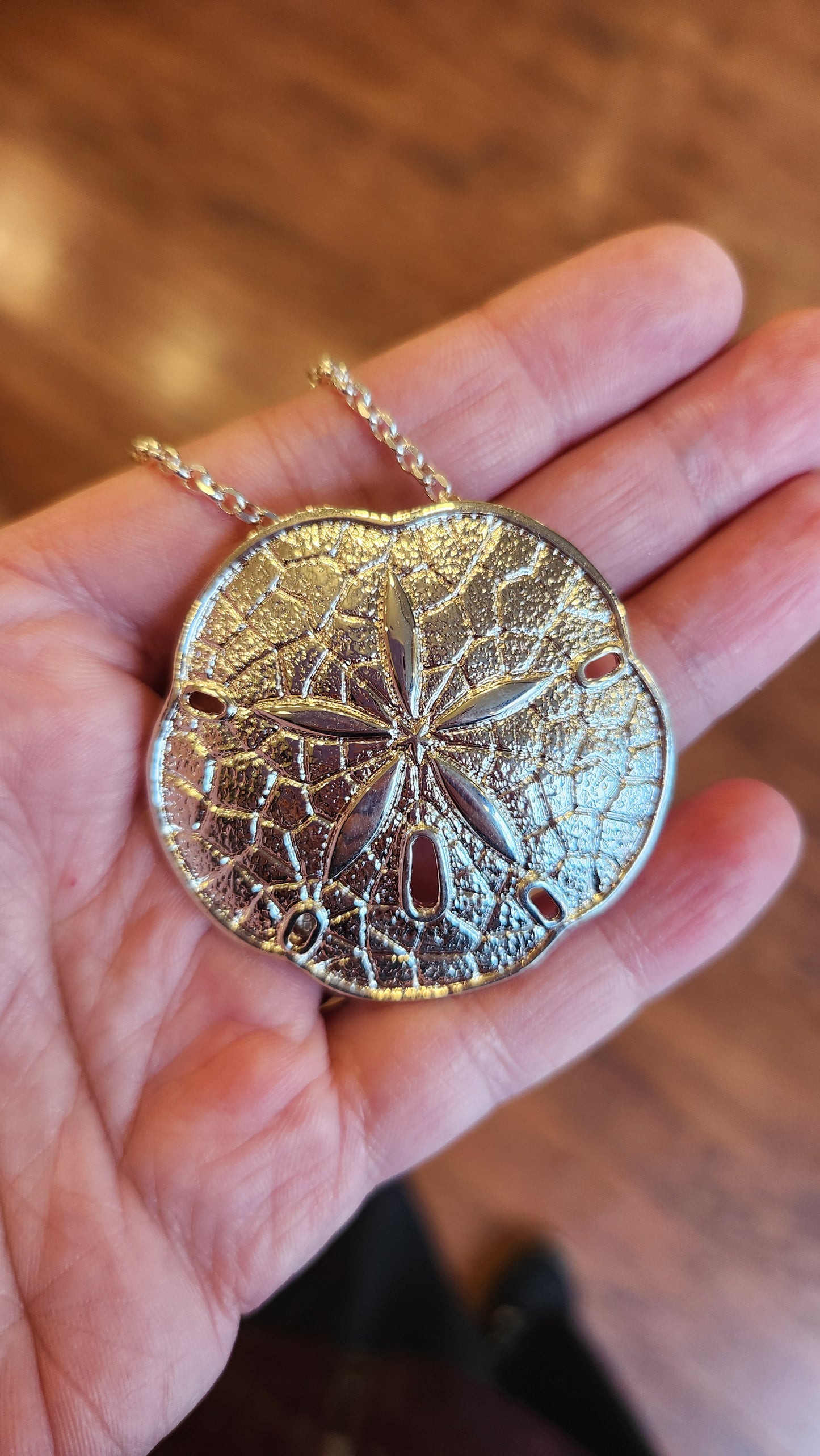 Large sterling silver sand dollar pendant