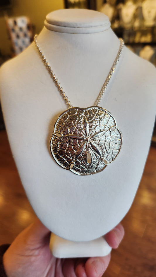 Large sterling silver sand dollar pendant