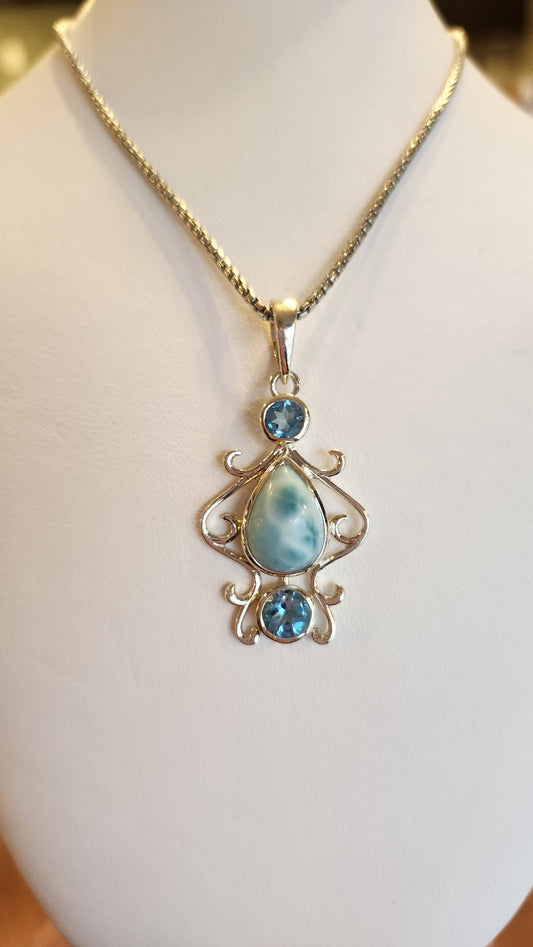 Sterling silver pear-shaped larimar pendant with blue topaz