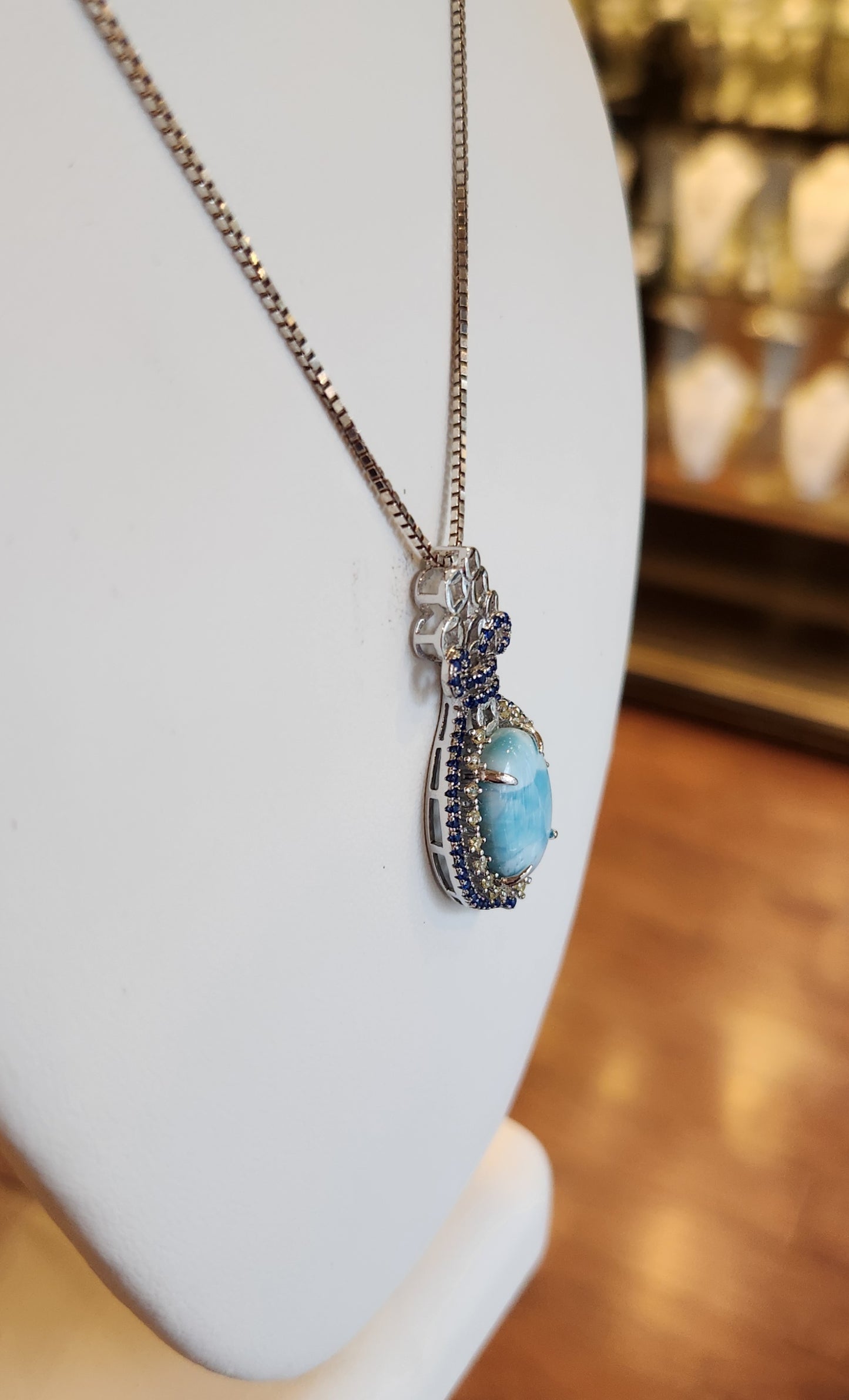 Sterling silver larimar pendant with blue and white crystals