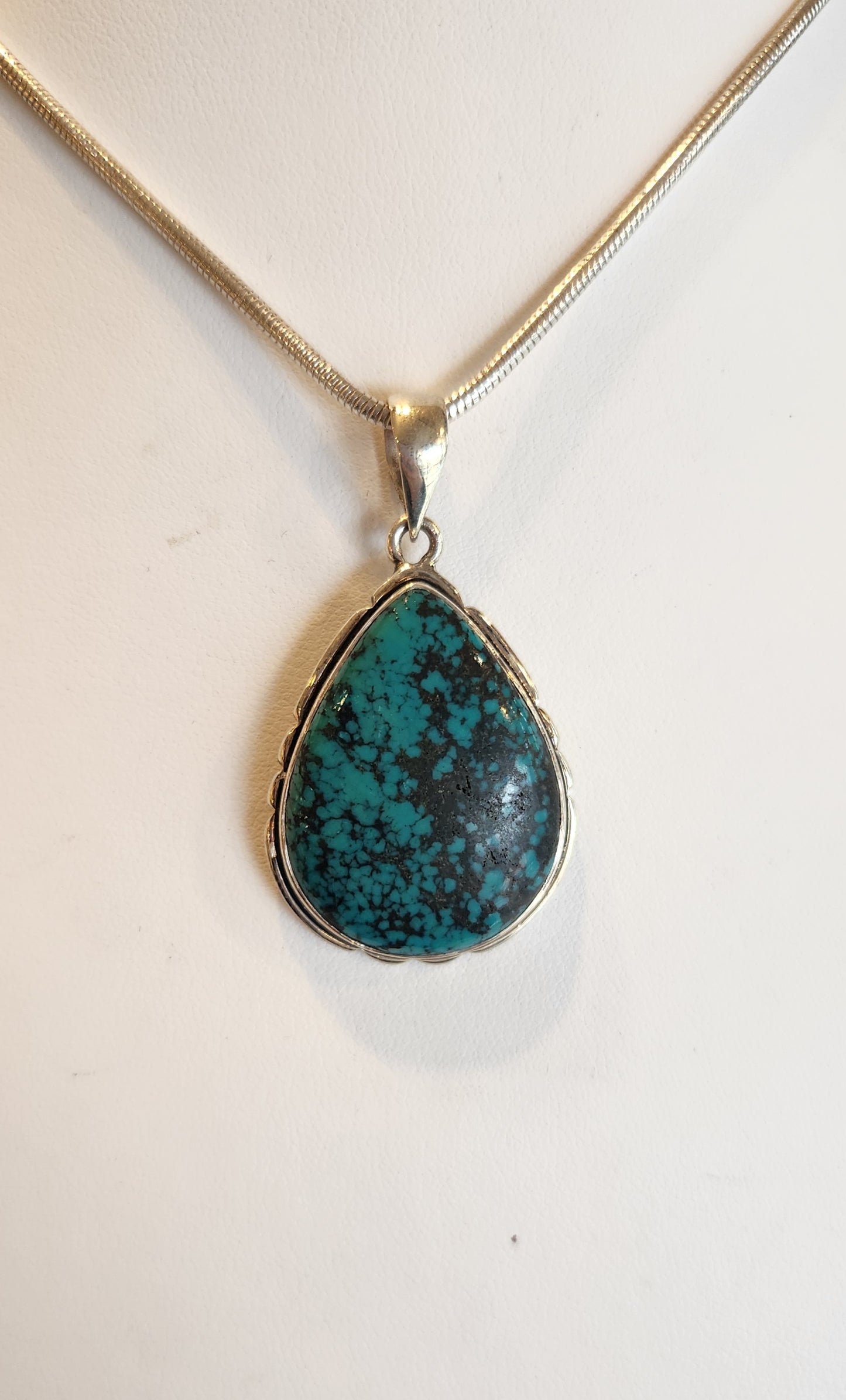 Sterling silver pear-shaped turquoise pendant