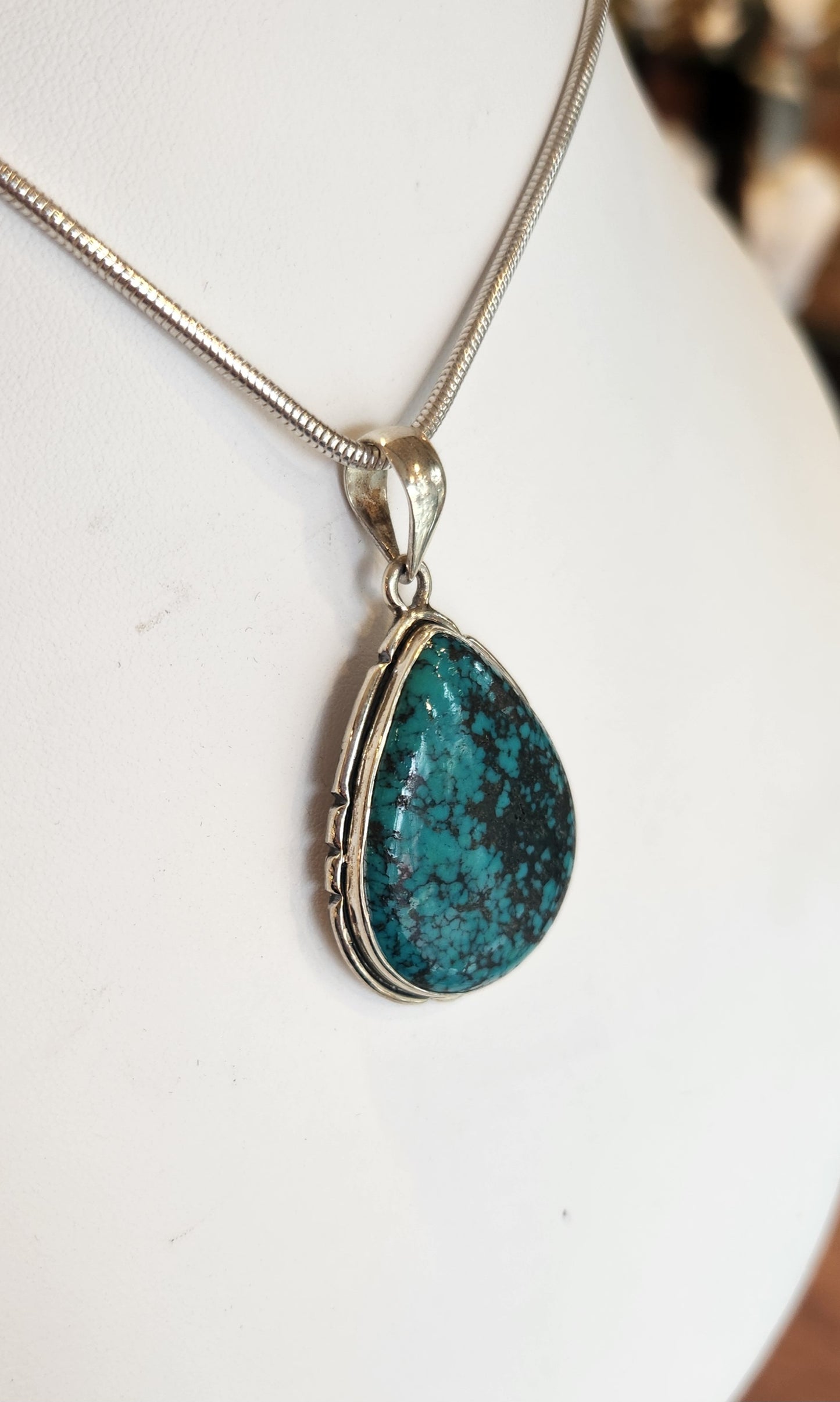 Sterling silver pear-shaped turquoise pendant