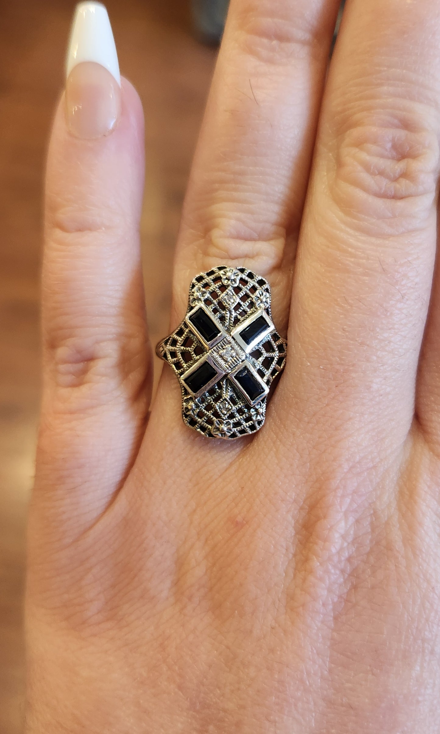 Sterling silver sapphire ring with filigree and diamonds