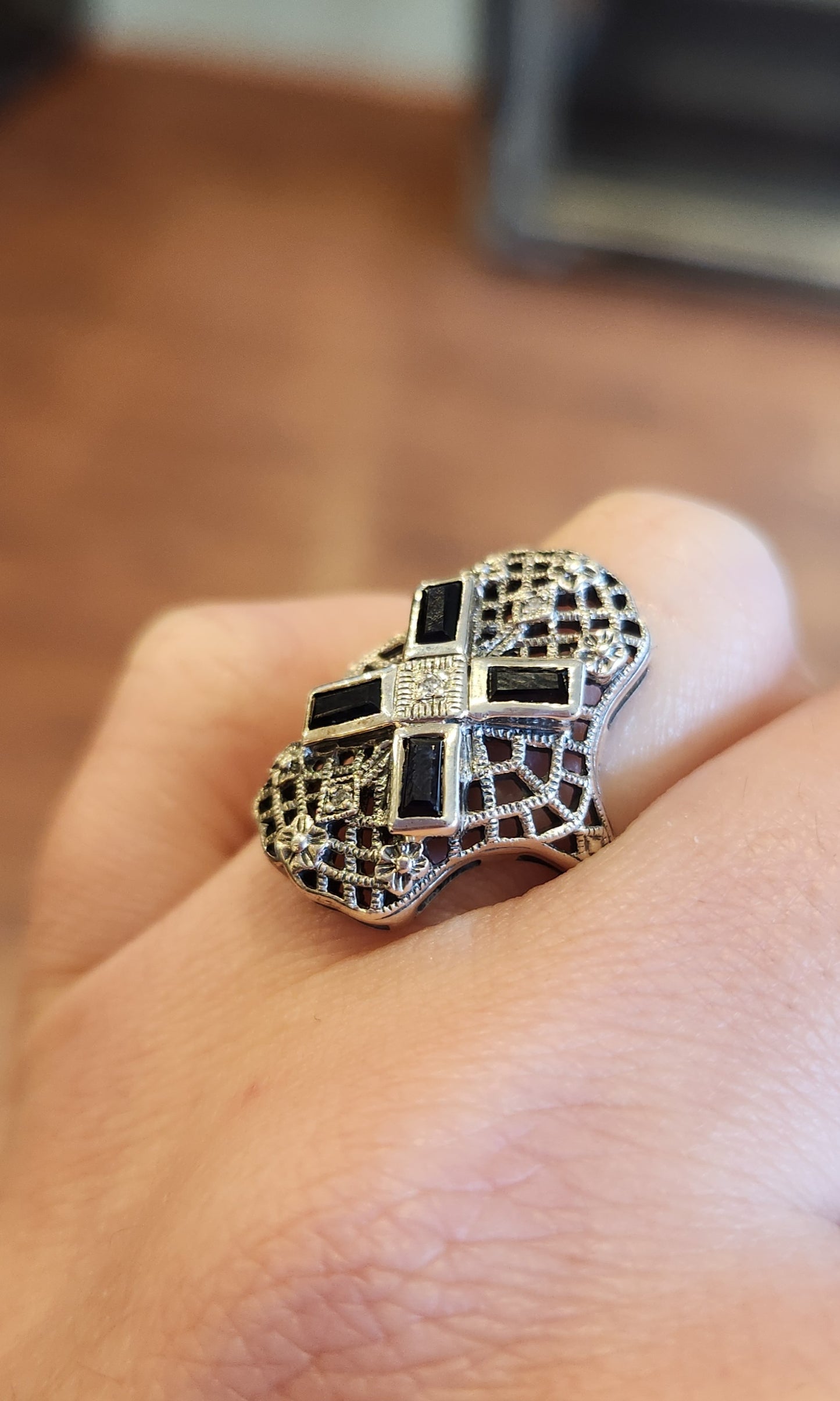 Sterling silver sapphire ring with filigree and diamonds