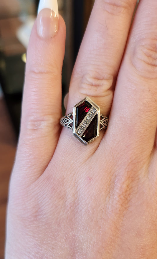 Sterling silver two-stone ring with garnet and diamonds