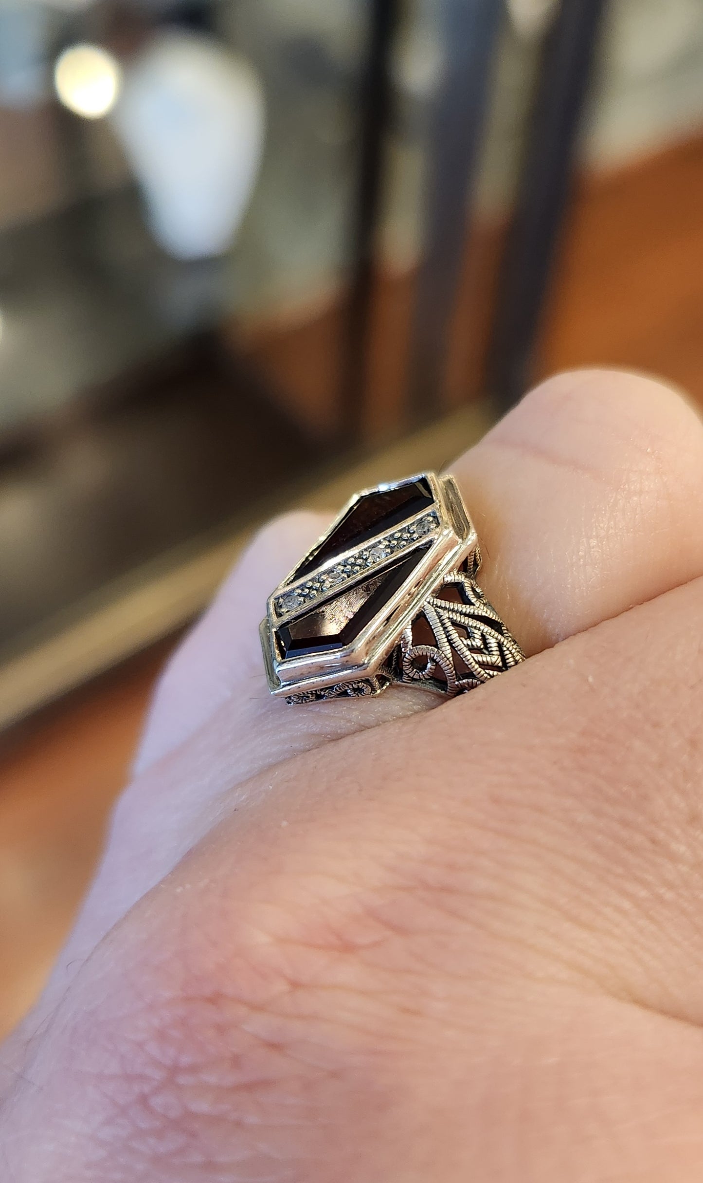 Sterling silver two-stone ring with garnet and diamonds