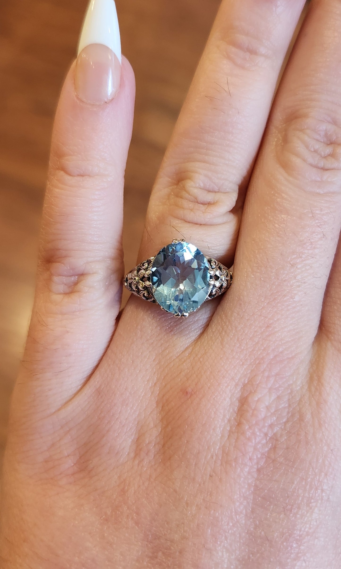 Sterling silver blue topaz Victorian style ring