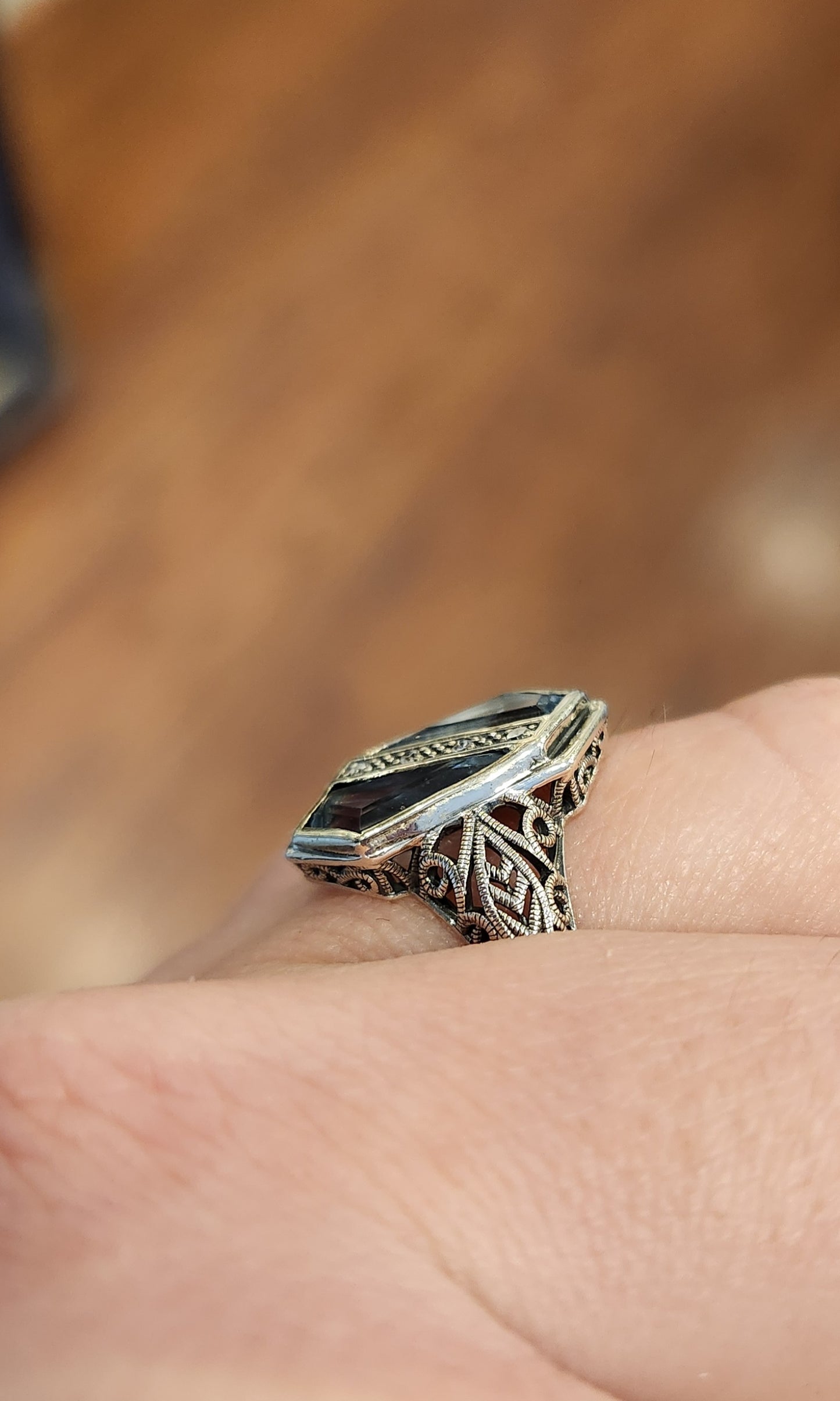 Sterling silver two-stone blue topaz ring with diamonds