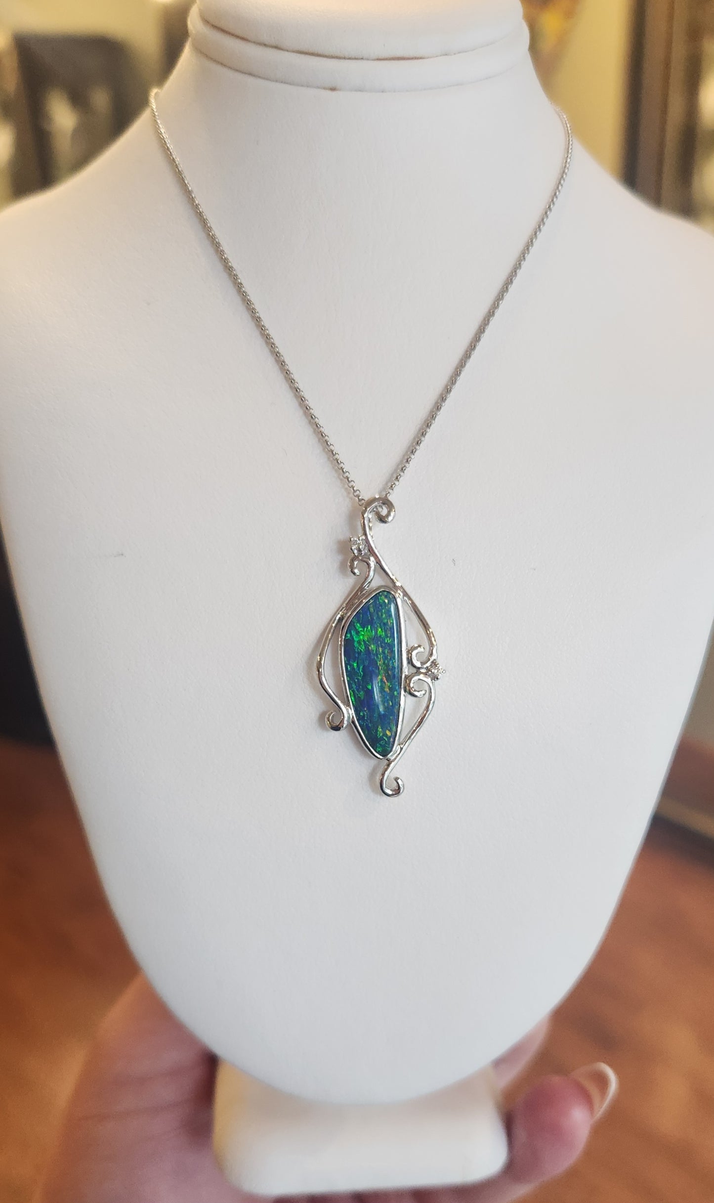 14k white gold black opal pendant with diamonds