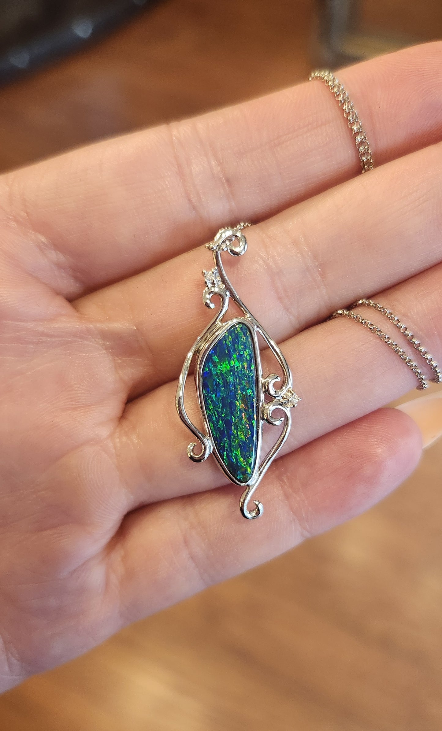 14k white gold black opal pendant with diamonds