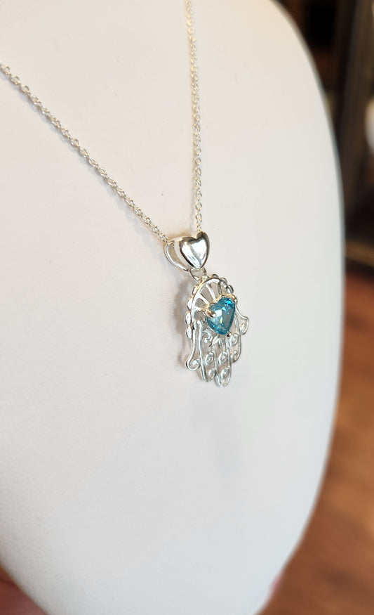 Sterling silver blue topaz Hamsa heart pendant