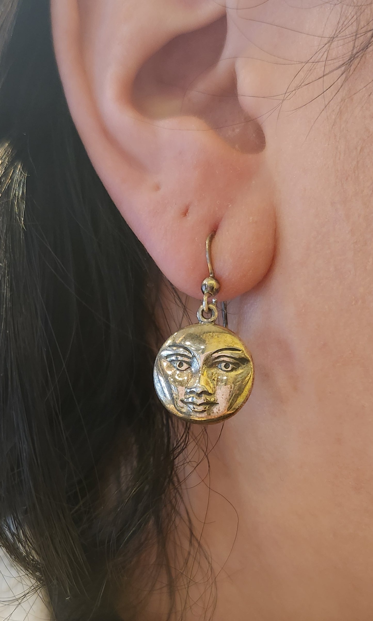 Sterling silver sun face dangle earrings