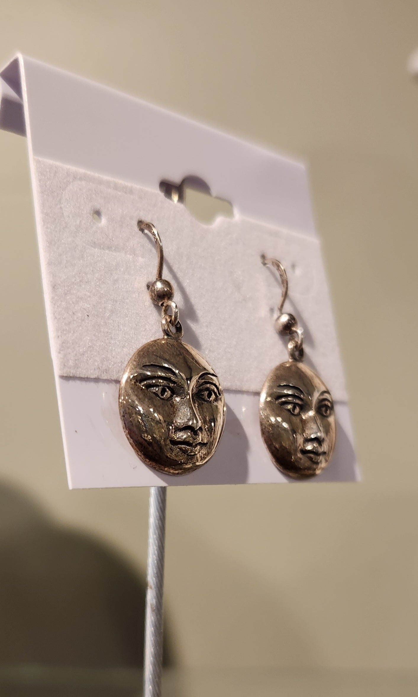 Sterling silver sun face dangle earrings