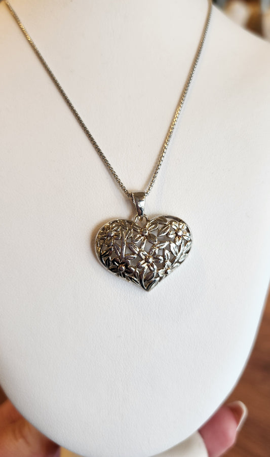 Sterling silver heart pendant with flowers