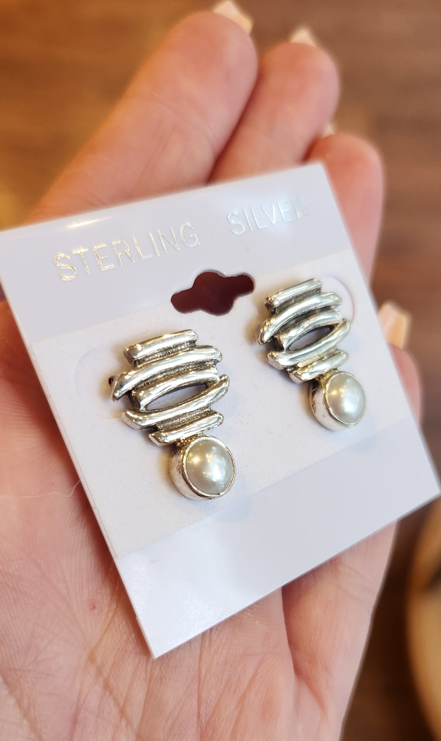 Sterling silver designer pearl earrings