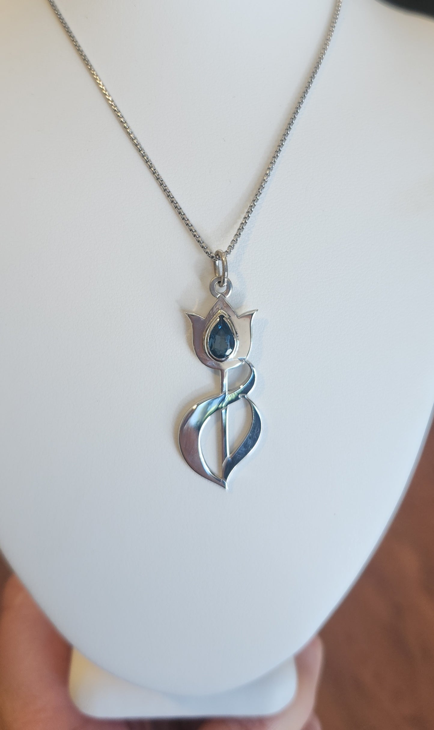 Sterling silver blue topaz tulip pendant