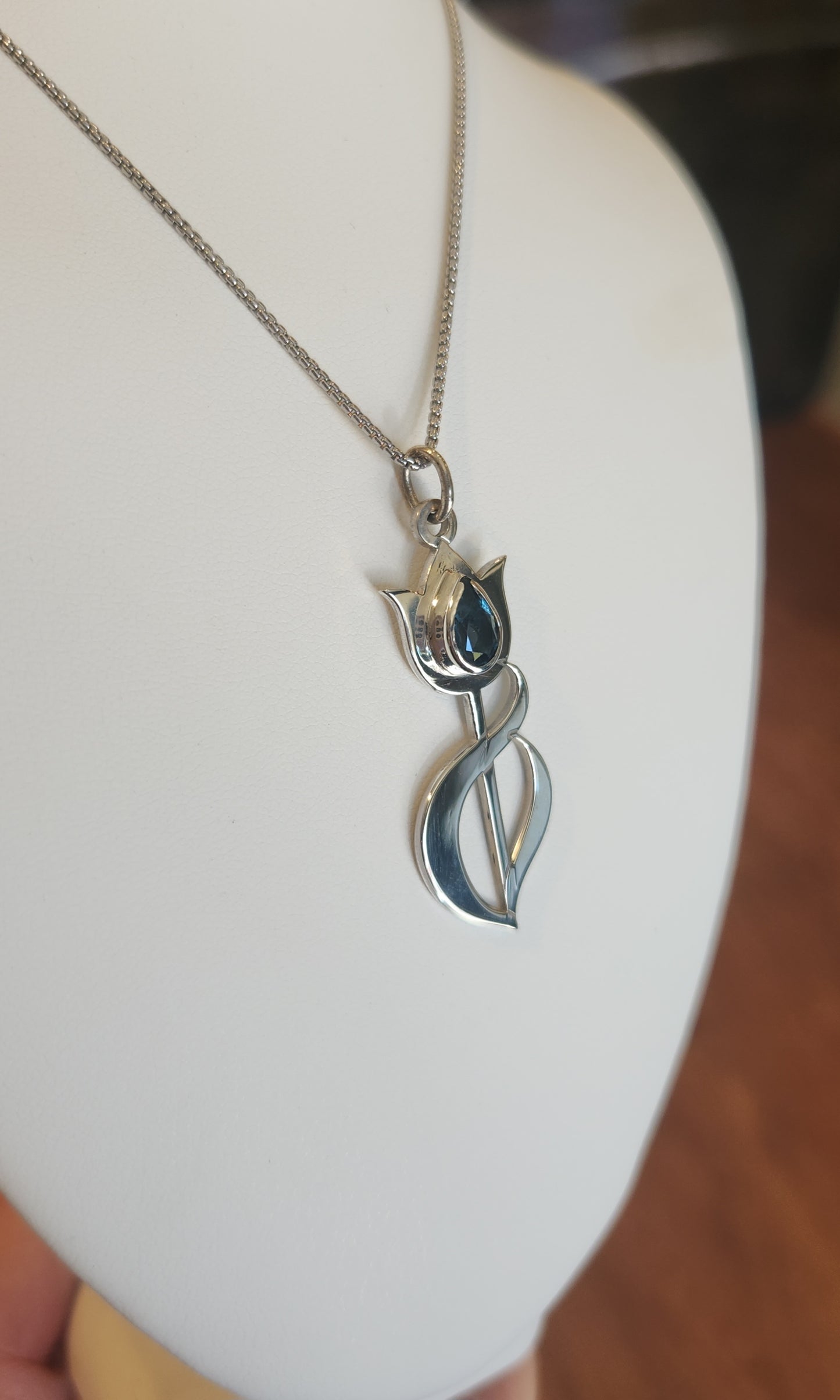 Sterling silver blue topaz tulip pendant