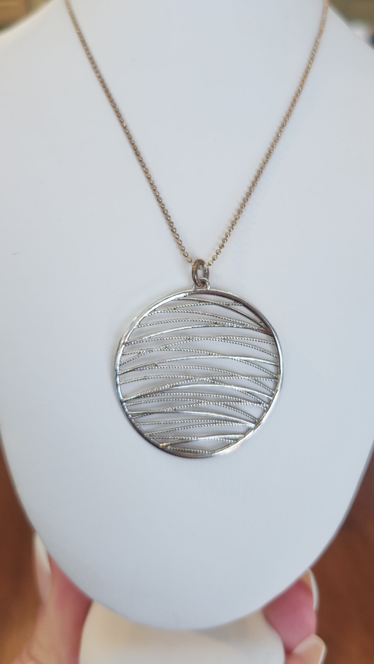 Sterling silver round textured pendant