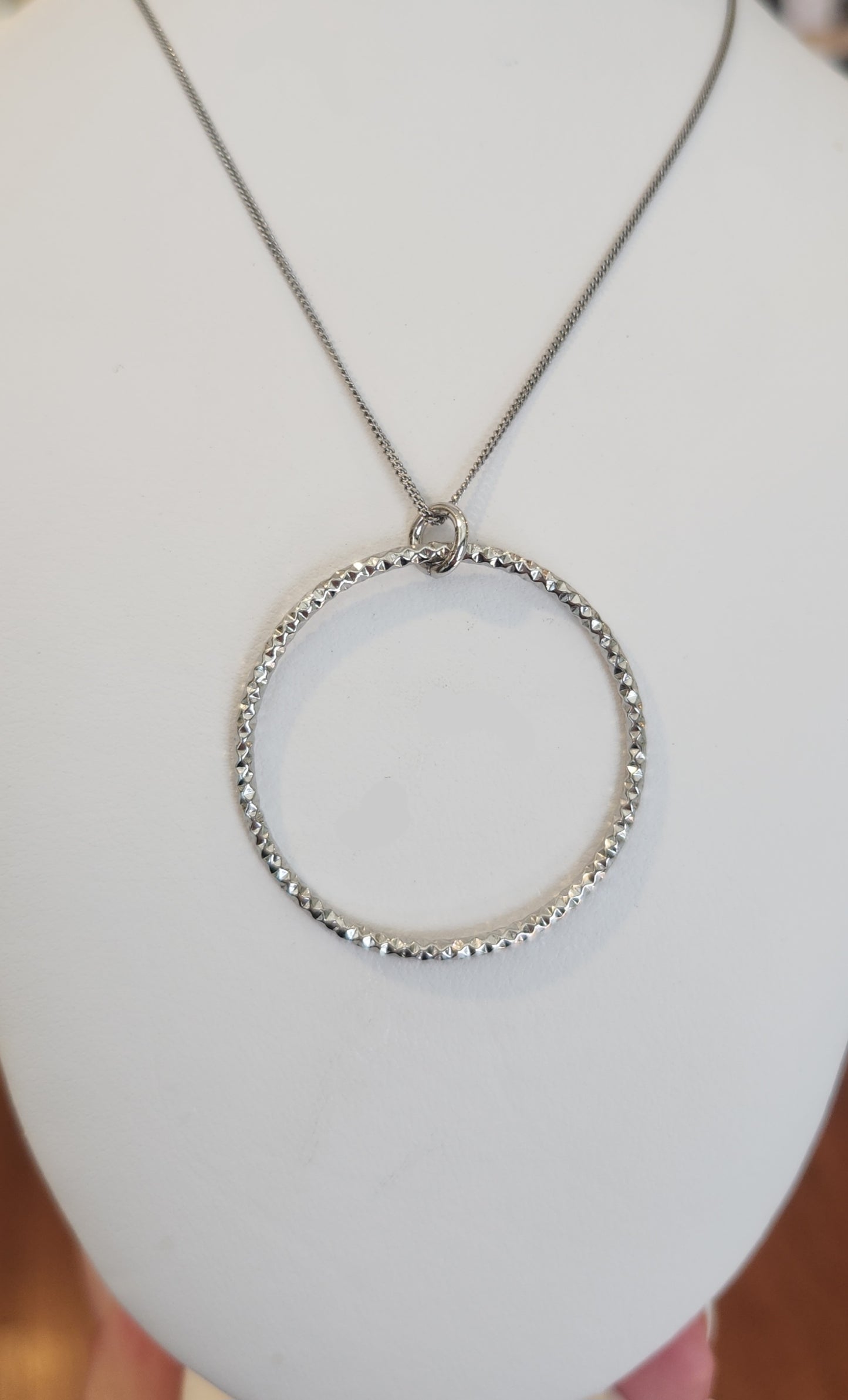 Sterling silver textured circle pendant