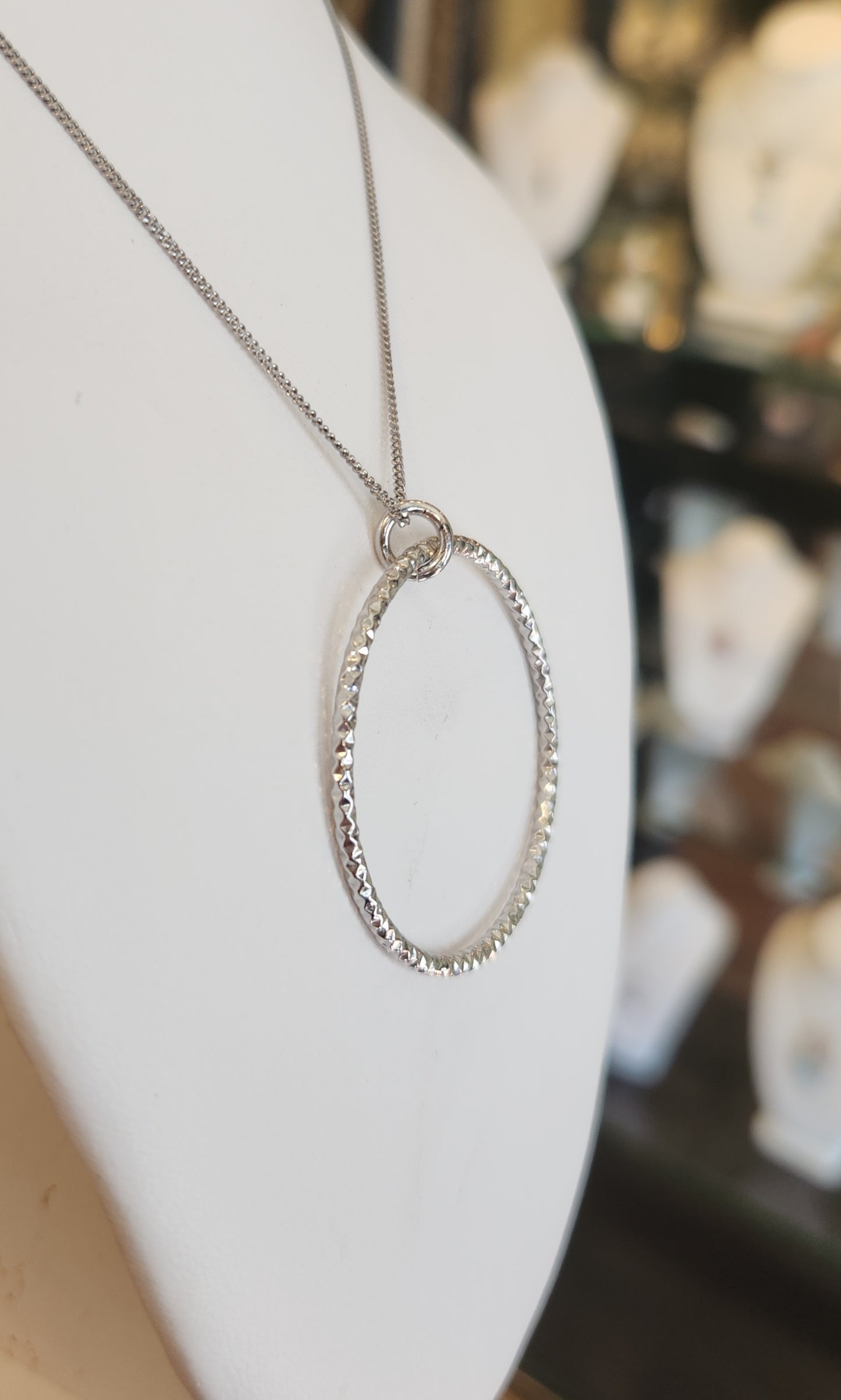 Sterling silver textured circle pendant