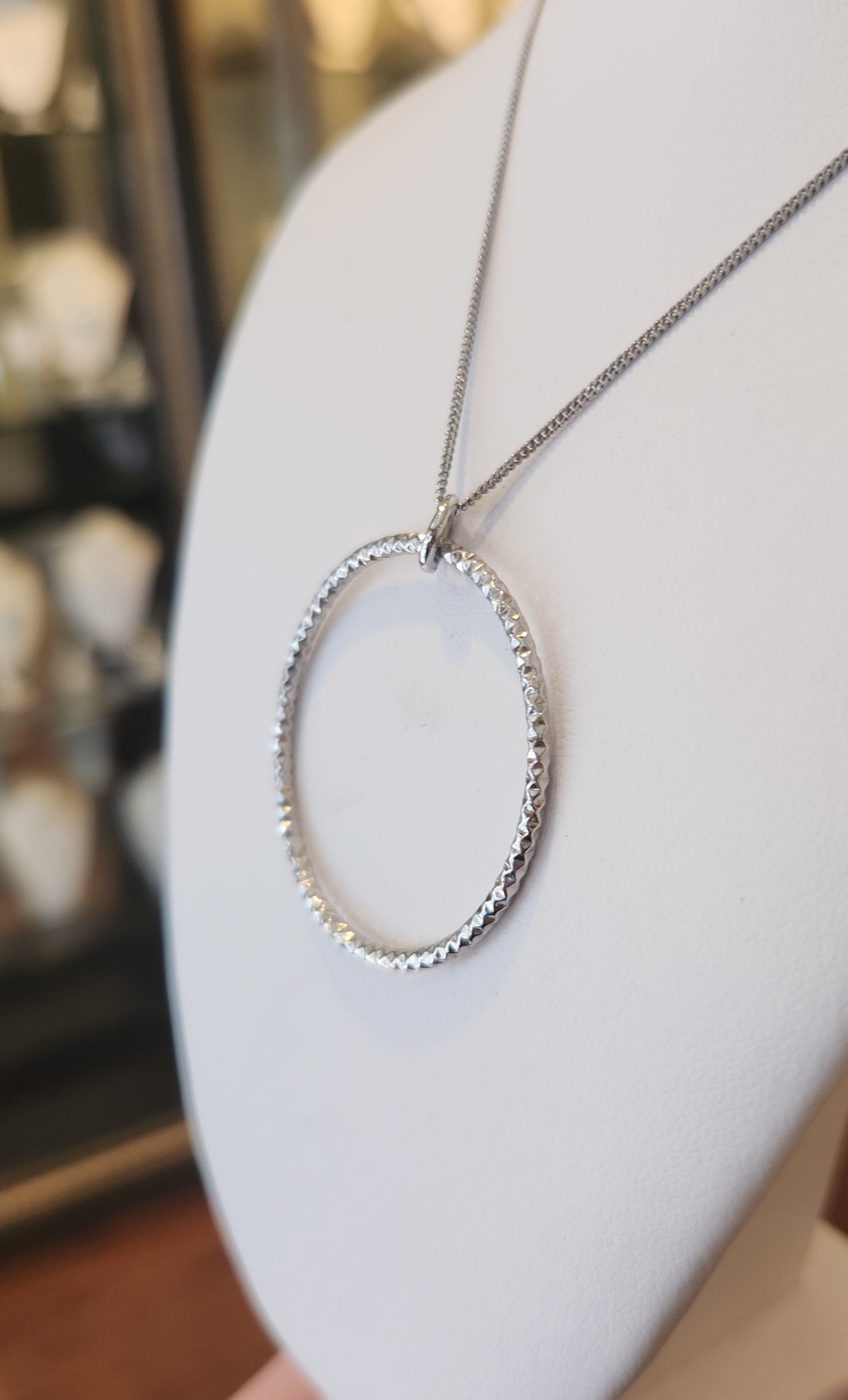 Sterling silver textured circle pendant