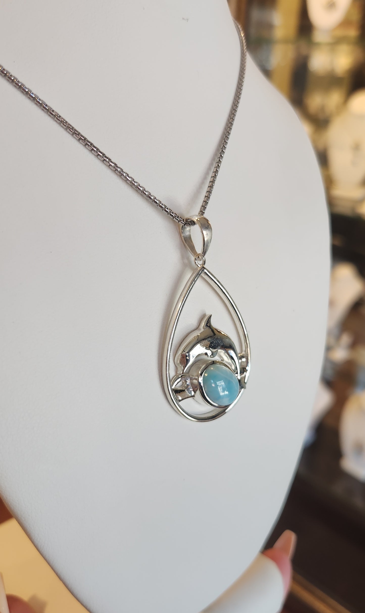 Sterling silver larimar dolphin pendant