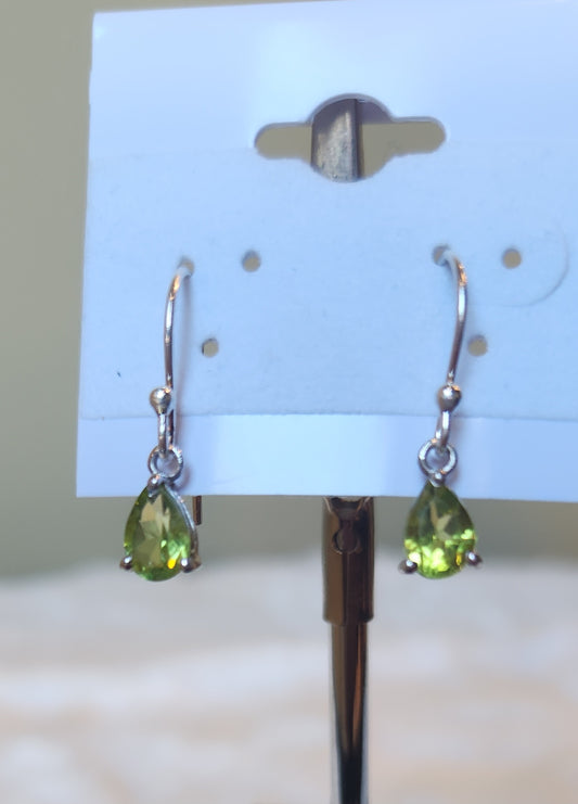 Sterling silver pear-shaped peridot dangle earrings