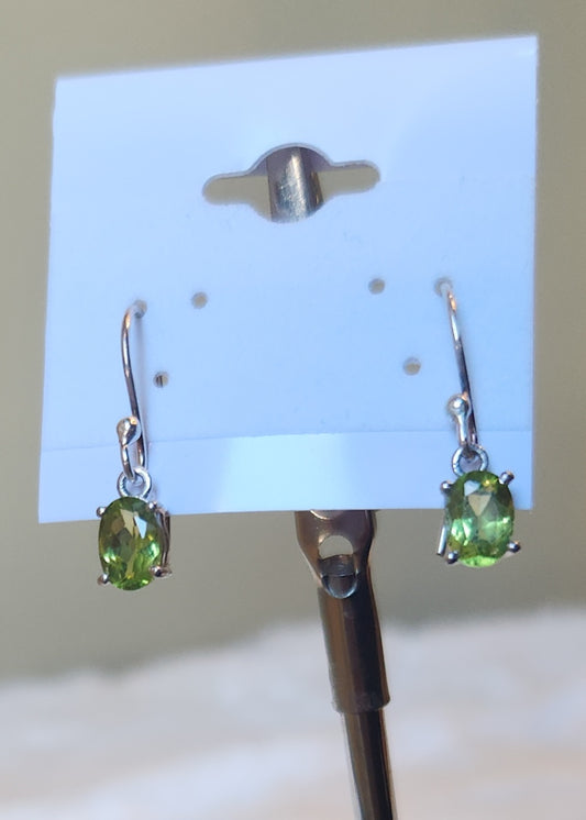 Sterling silver oval peridot dangle earrings