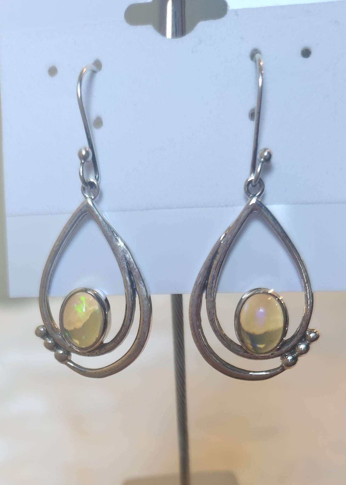 Sterling silver oval welo opal cabochon dangle earrings