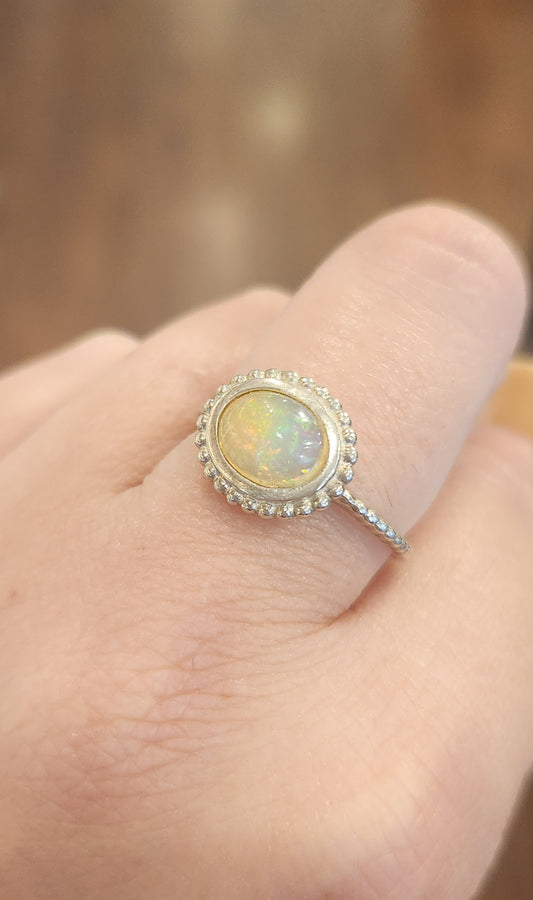 Sterling silver east-to-west welo opal ring