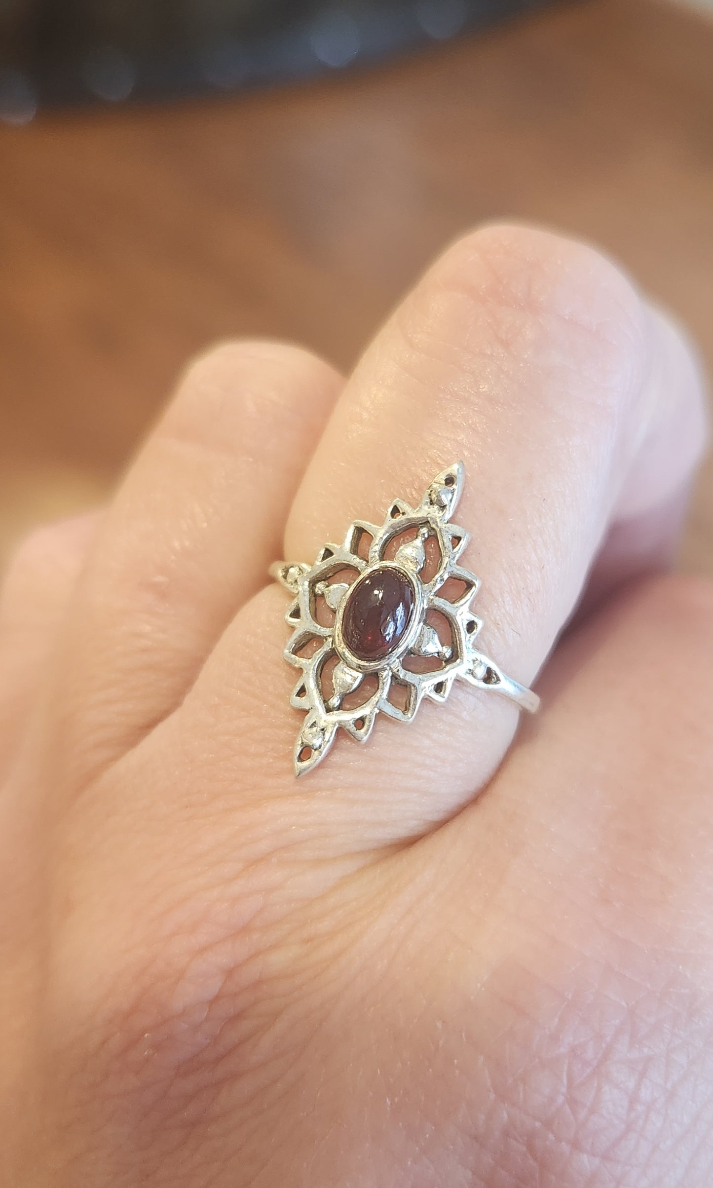 Sterling silver unique oval-shaped garnet ring