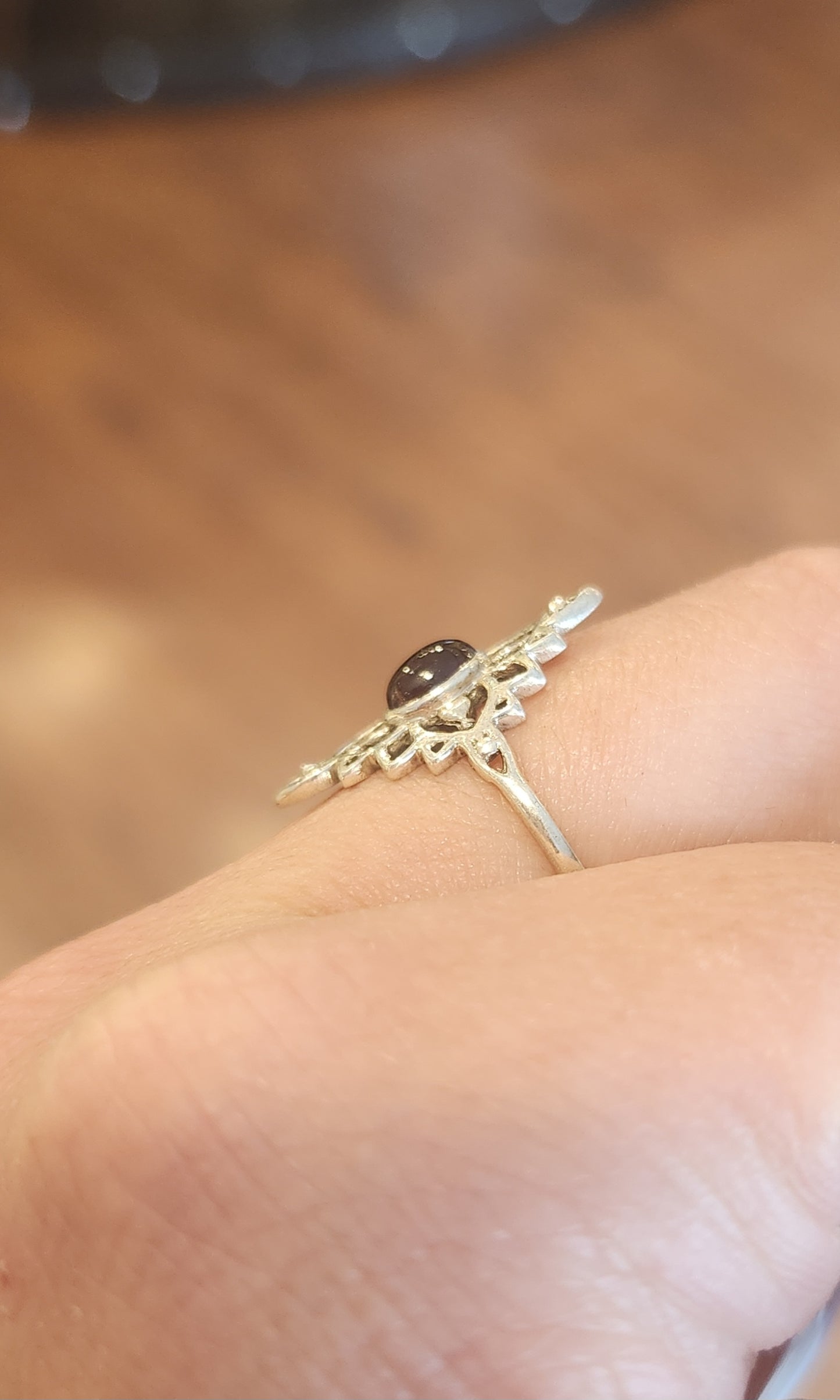 Sterling silver unique oval-shaped garnet ring