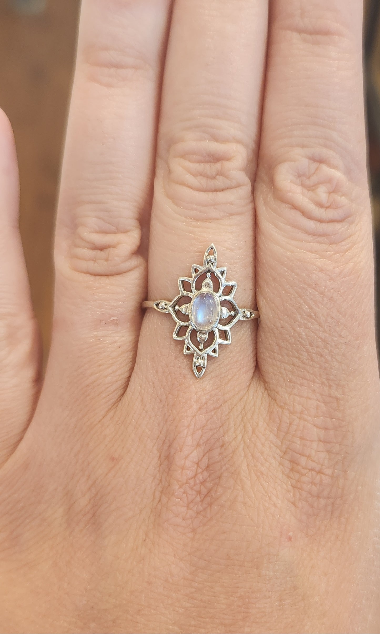 Sterling silver unique oval-shaped rainbow moonstone ring