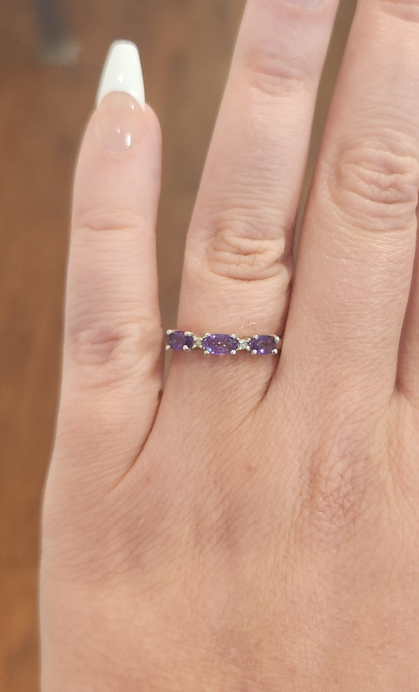 Sterling silver three-stone amethyst ring