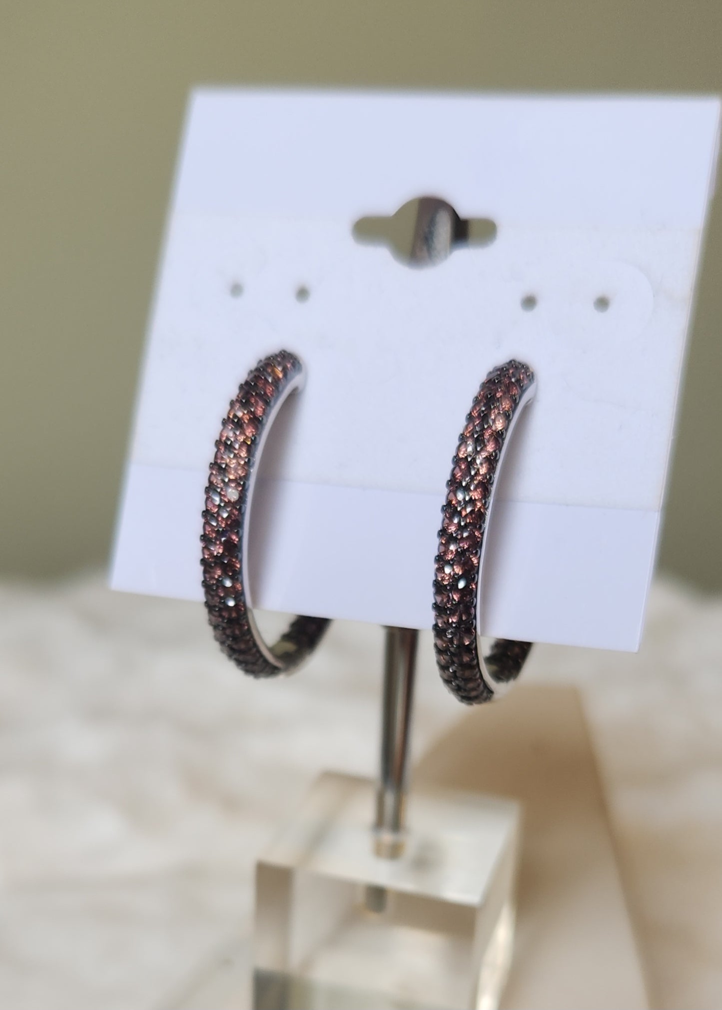 Sterling silver peach-colored CZ in-and-out hoop earrings