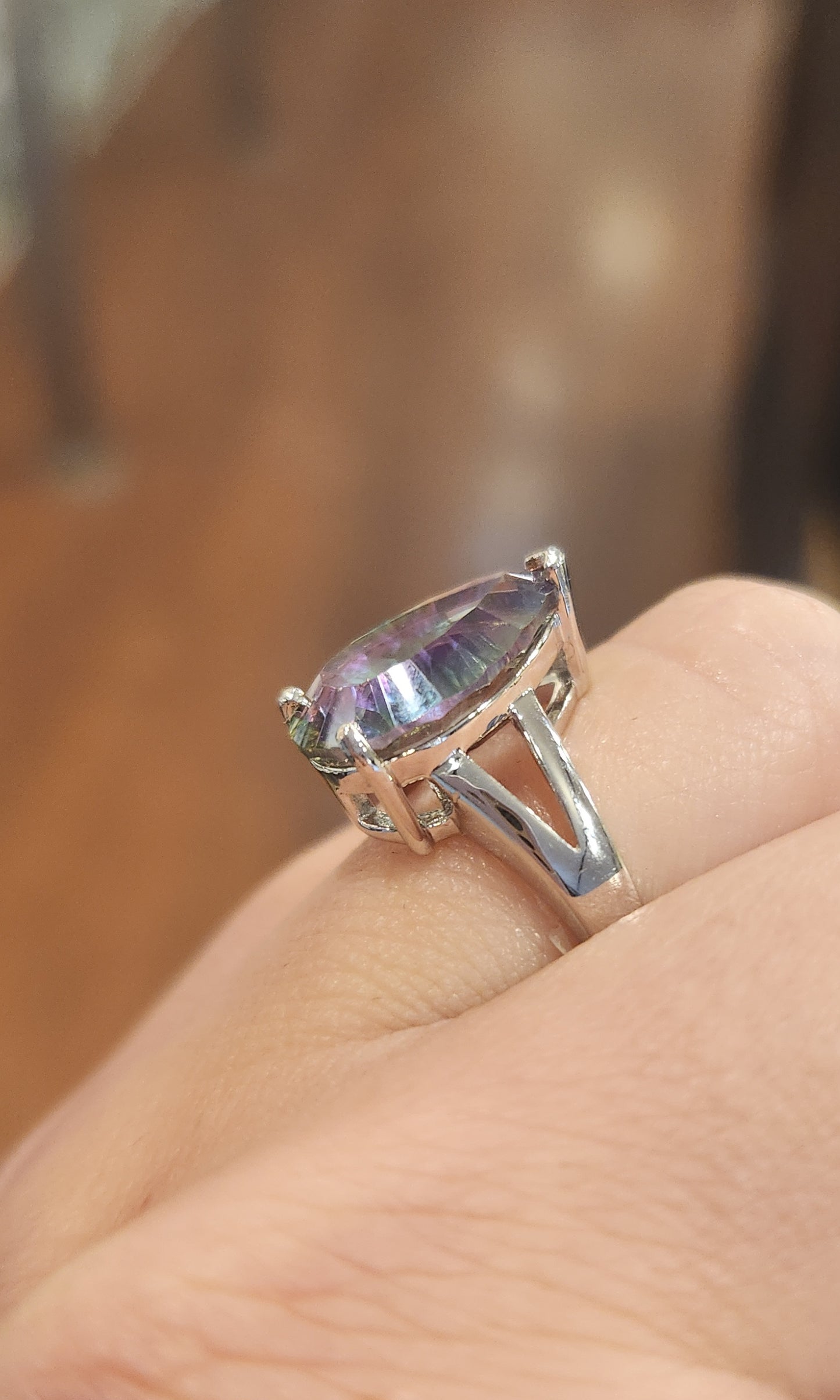 Sterling silver pear-shaped mystic topaz ring