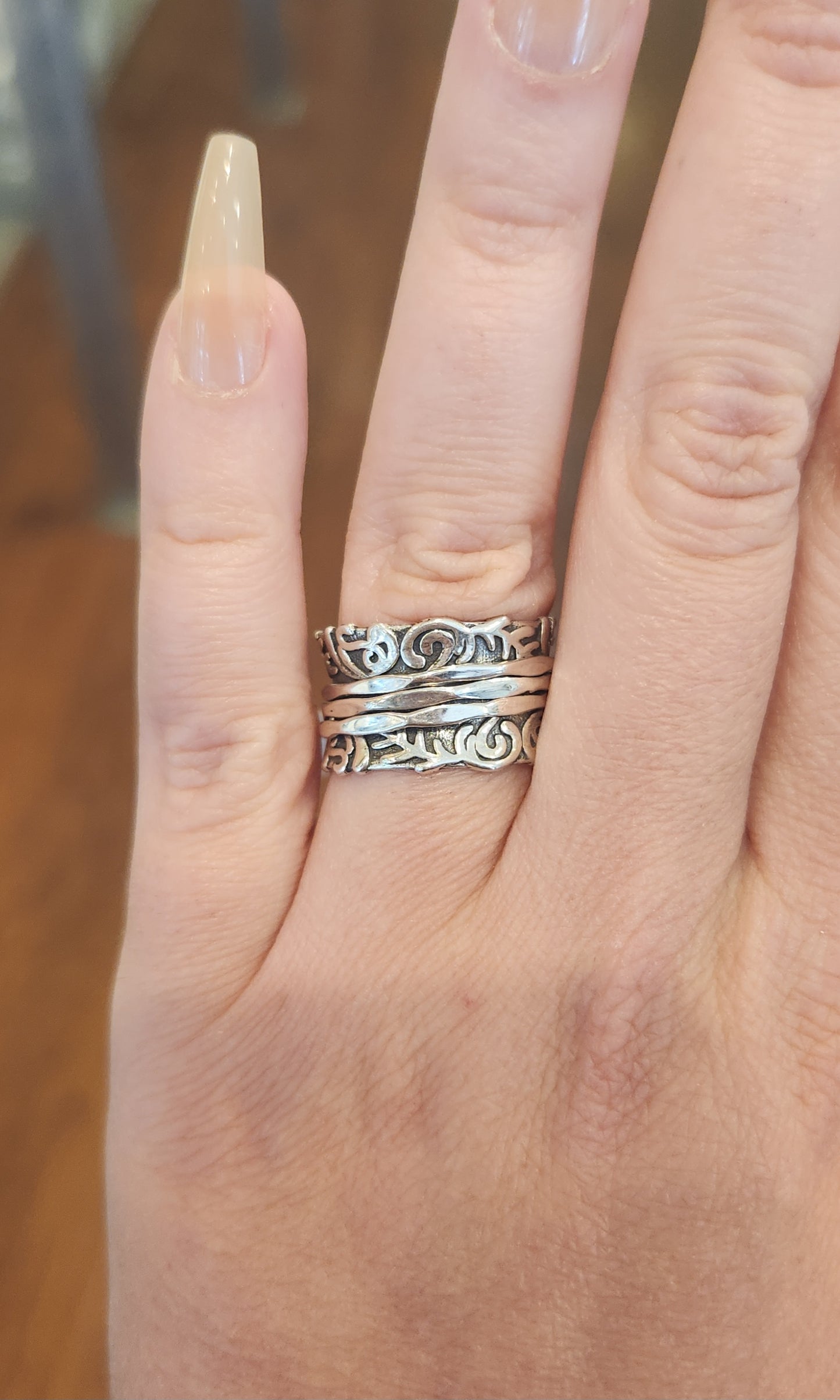 Sterling silver triple-band spinner ring