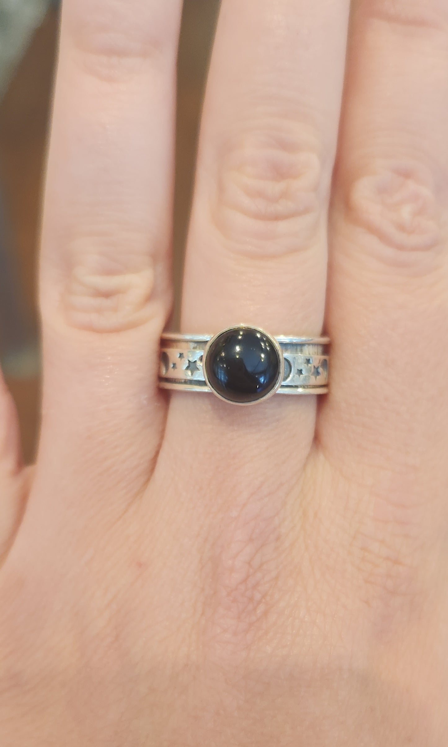 Sterling silver black onyx moon and star spinner ring