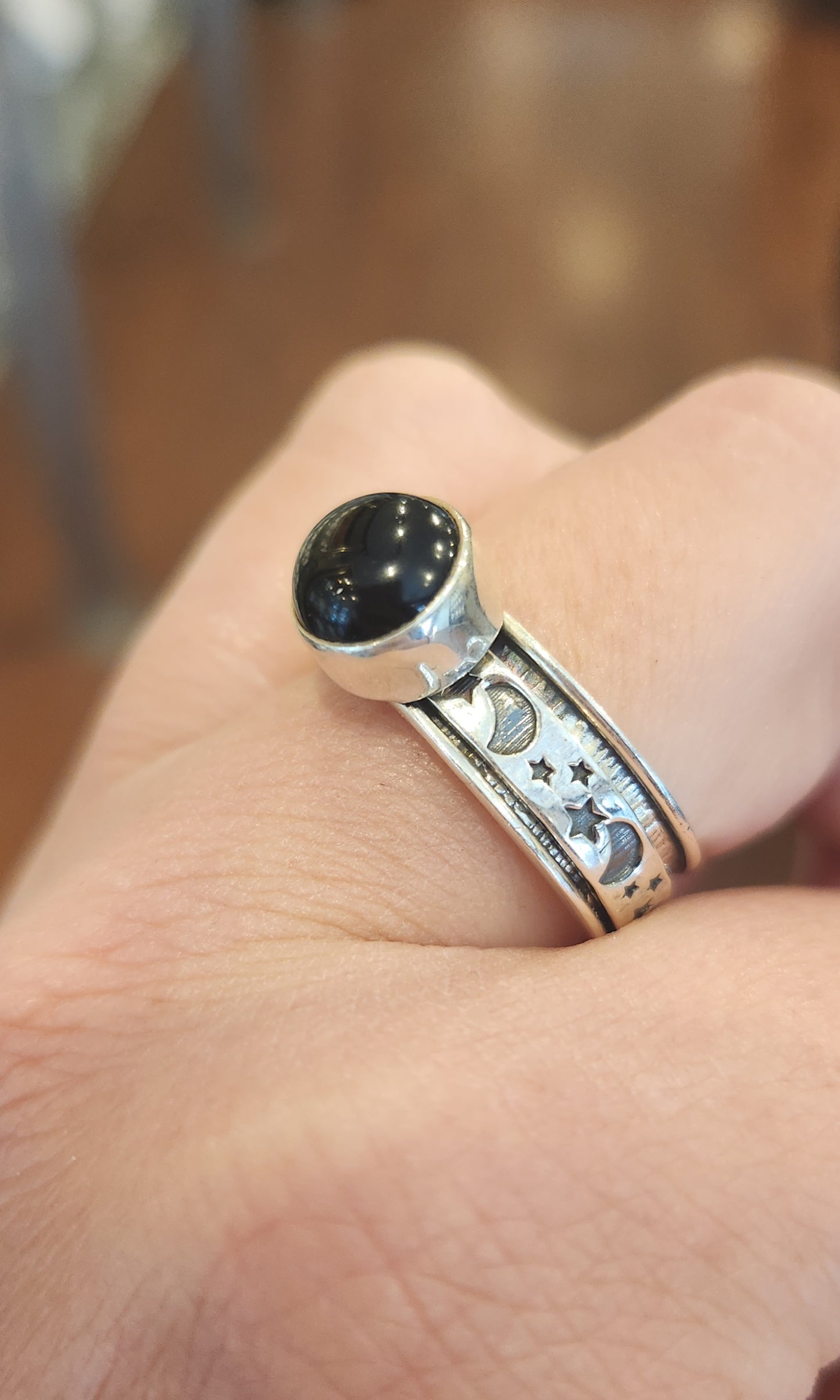 Sterling silver black onyx moon and star spinner ring